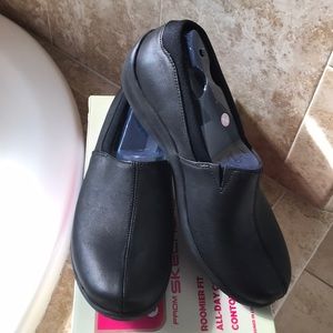 Skechers leather slip on shoes with memory foam.